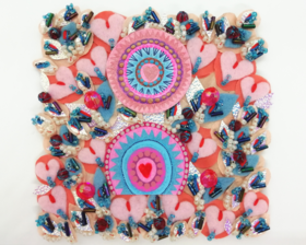 Decorative and texture pink and blue mixed media art which is full of hand stitched hearts made from fabrics, and 2 painted hearts, on a small 4 inch canvas panel.